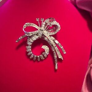 The year of the Broach! 2026!  Deco style silver spray rhinestone ribbon Broach